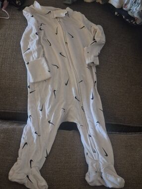 Nike White Footed Baby One-Piece with Black Swoosh Pattern